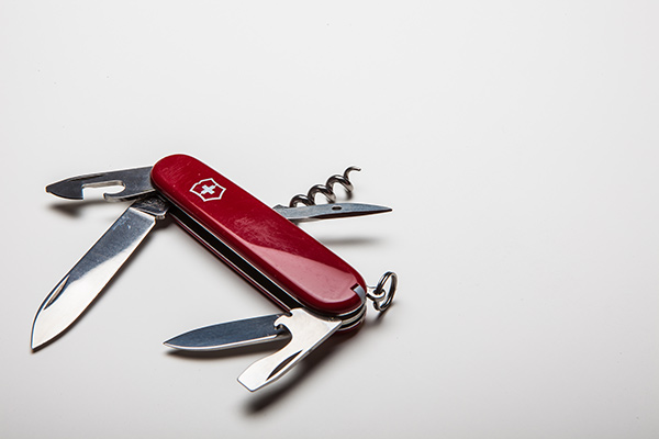 photo of a swiss army knife, symbolic of the many tasks it completes, similar to a divorce coach in Alberta